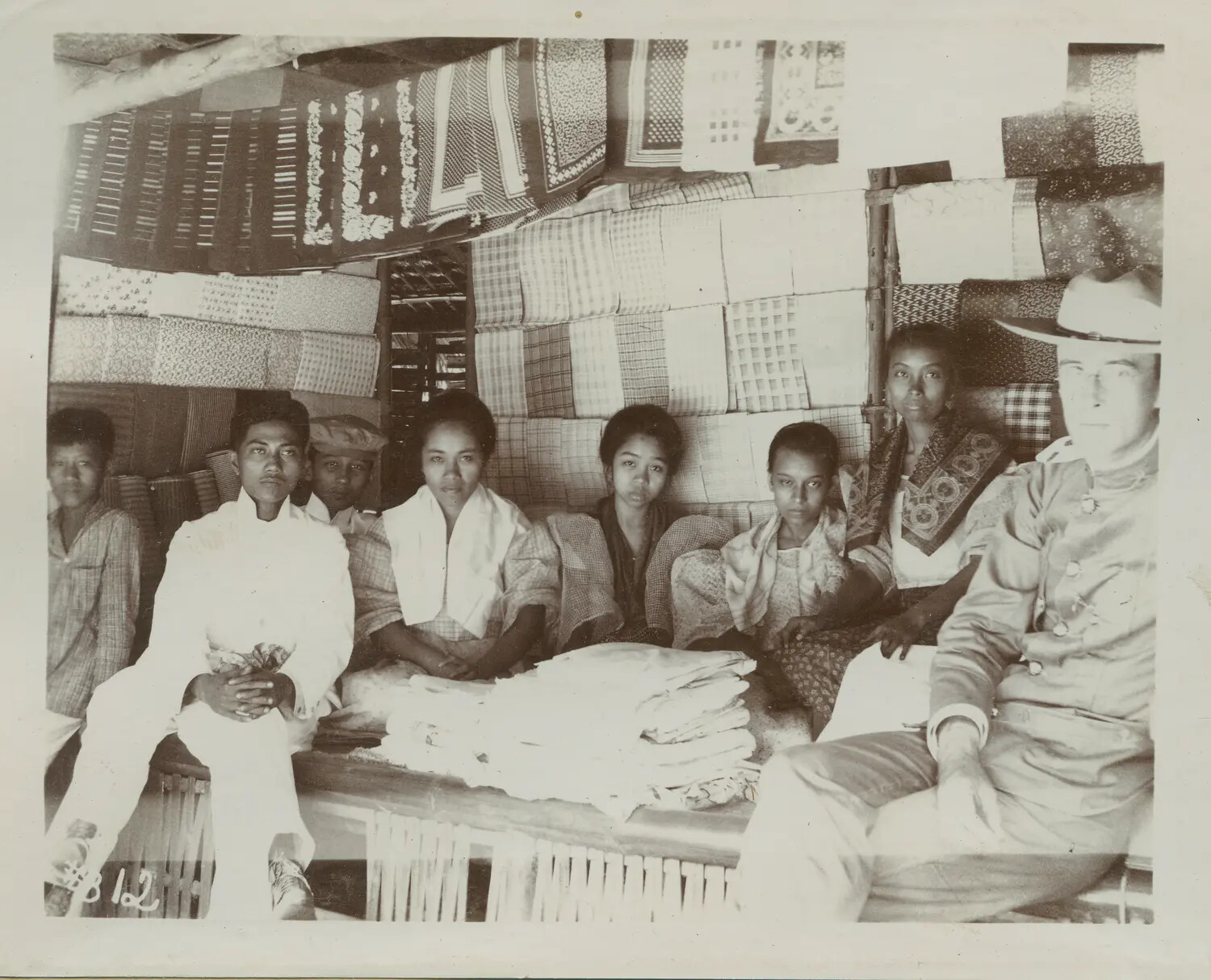 Filipino Textile Vendors with American Serviceman, Philippines, c. 1898-1905