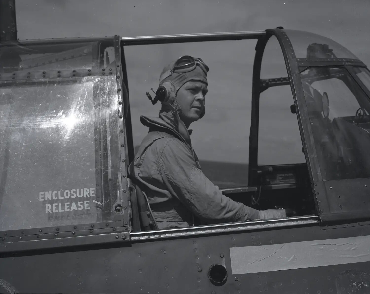 U.S. Navy Fighter Pilot in Cockpit, Escort Carrier, World War II