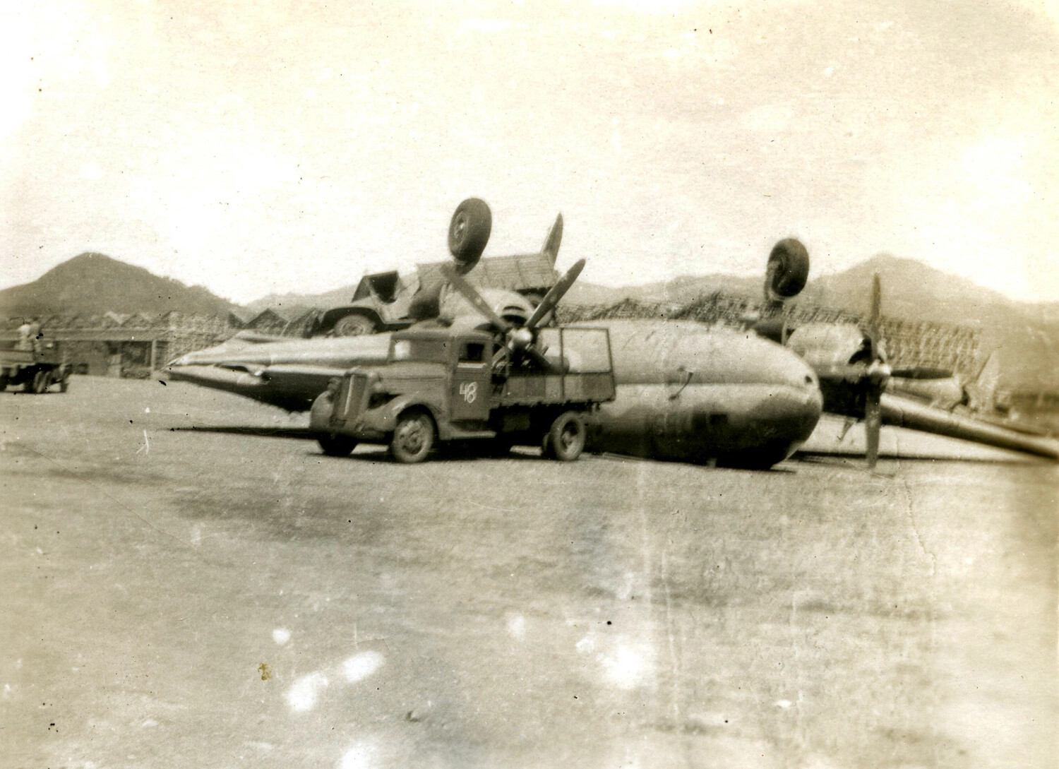 Overturned B-25 Mitchell Bomber, 345th Bombardment Group, Ie Shima, WWII