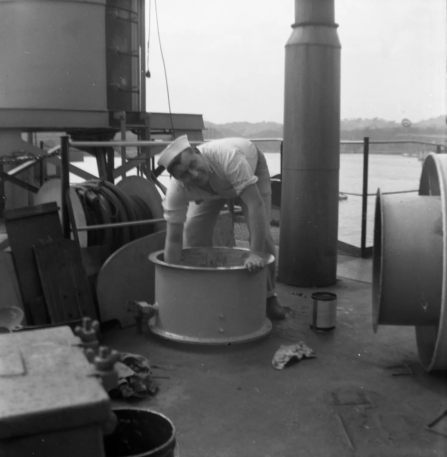 Sailor Cleaning Deck Fitting Aboard Ship, Sasebo, Japan