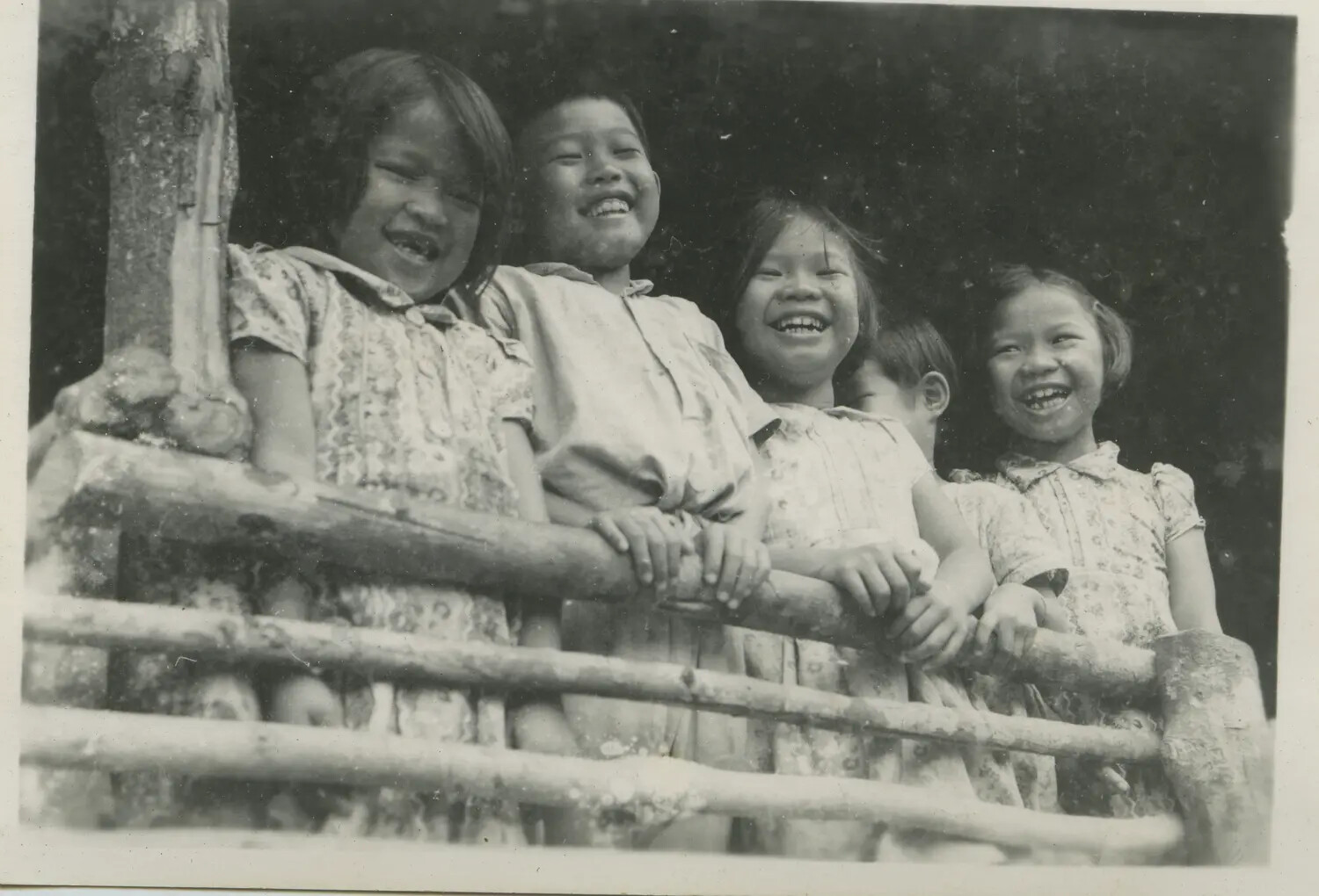 Local Children at a Wooden Fence, Philippines or Pacific Theater, 312th Bombardment Group Collection, WWII