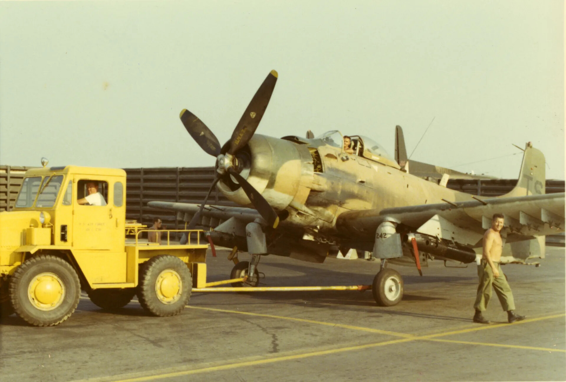 A-1 Skyraider No. 242 Under Tow, Vietnam Air Base