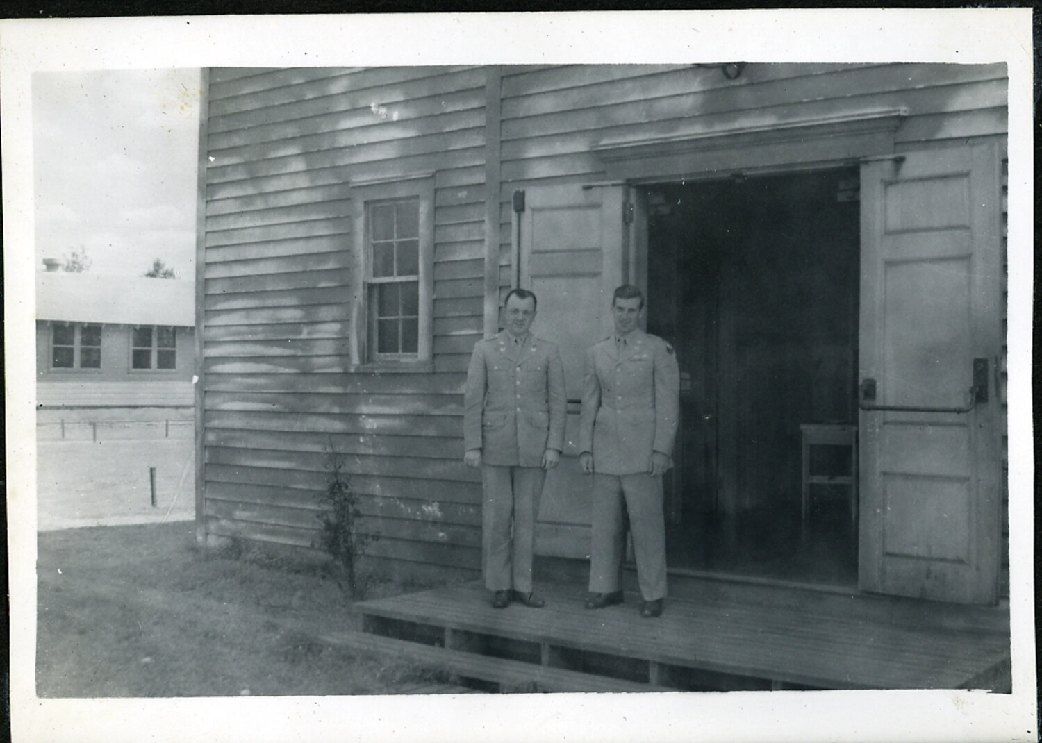 Two U.S. Military Officers Outside Wooden Barracks Building, Postwar Japan Occupation Album (Hiroshima)