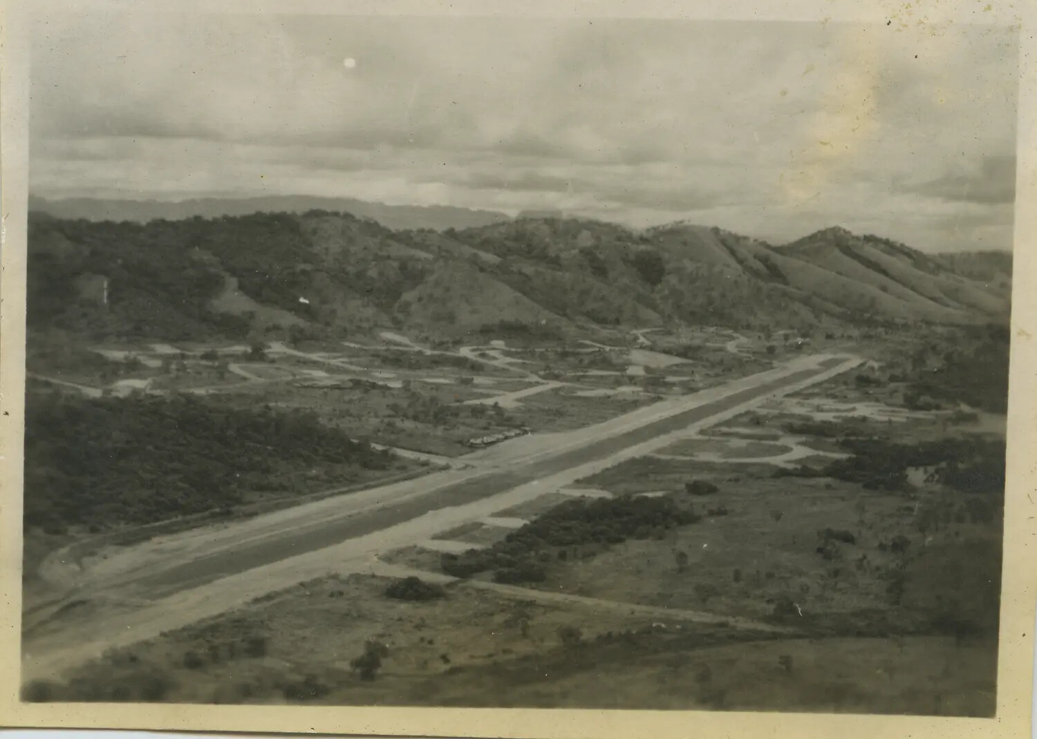 Aerial View of Forward Airbase Runway and Dispersal Bays, 312th Bomb Group Collection, WWII Pacific Theater