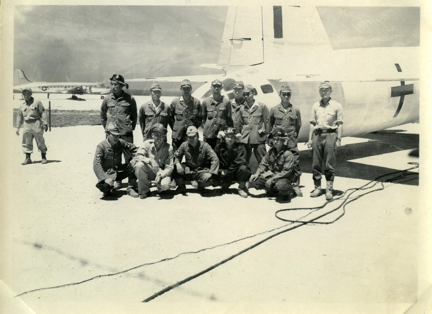Japanese Aircrew Group Portrait at Tail of 'Green Cross' Aircraft, Ie Shima, August 1945