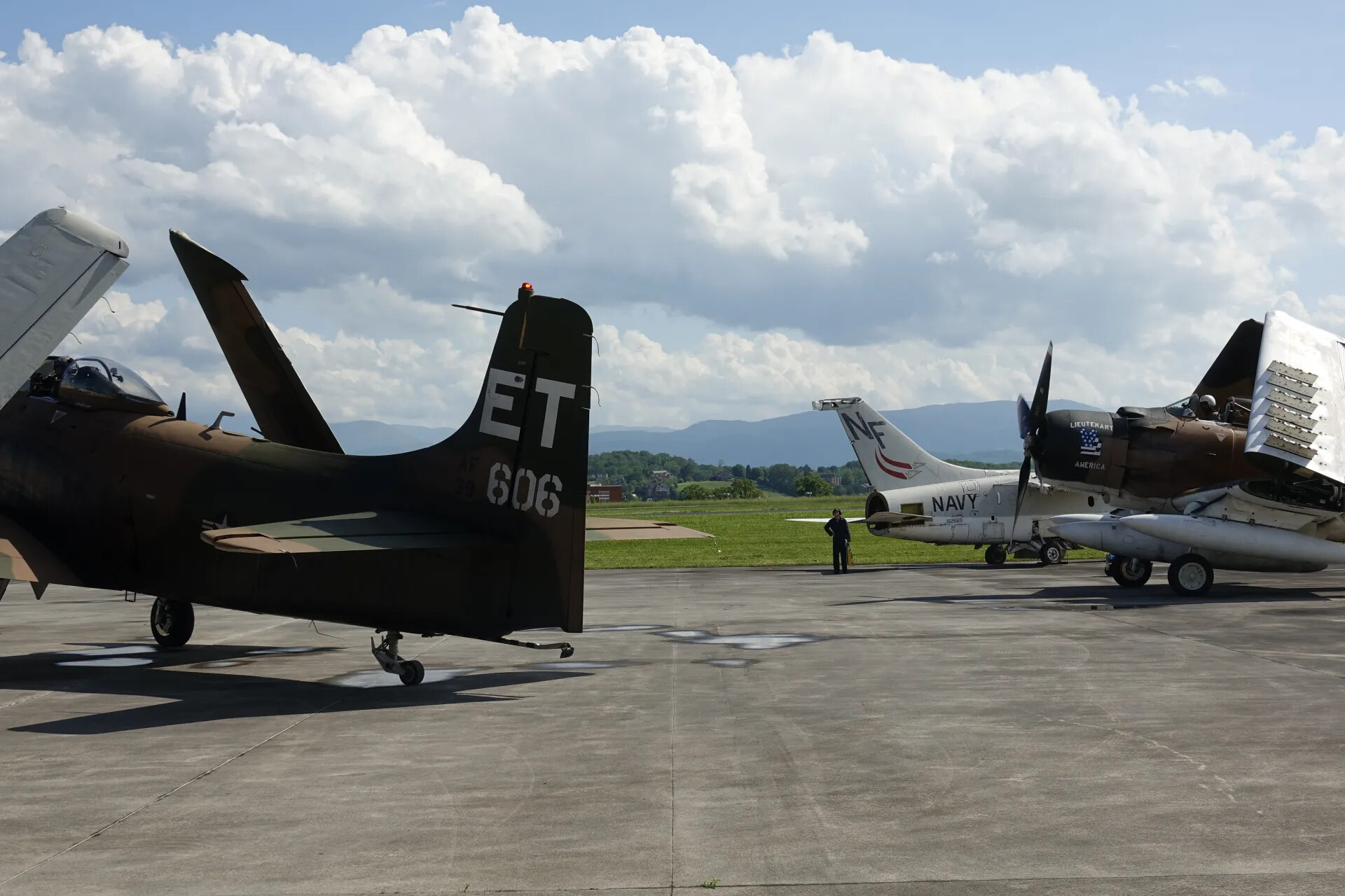 Flightline View with A-1 Skyraiders and Navy A-7 Corsair II, Warbird Gathering