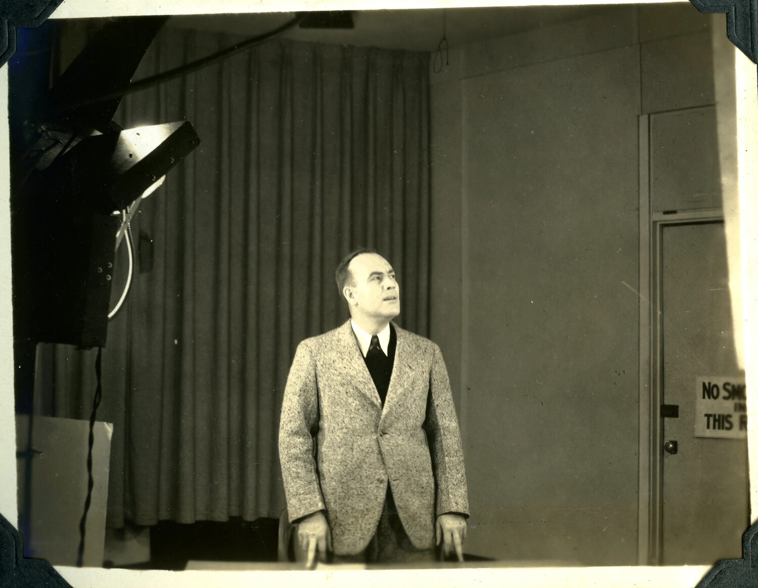 Man Under Studio Lighting on Film Set, Jervey Signal Corps Album - 'Making Film' Series