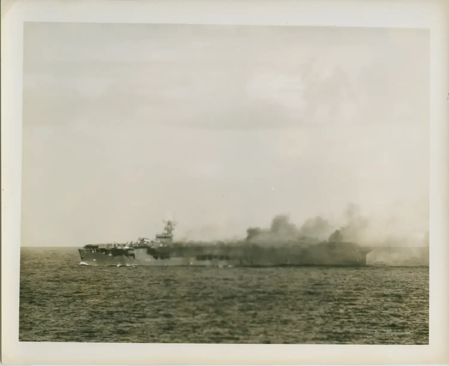 USS Petrof Bay (CVE-80) Underway, Smoke Billowing from Flight Deck, Leyte Gulf Campaign, October 1944