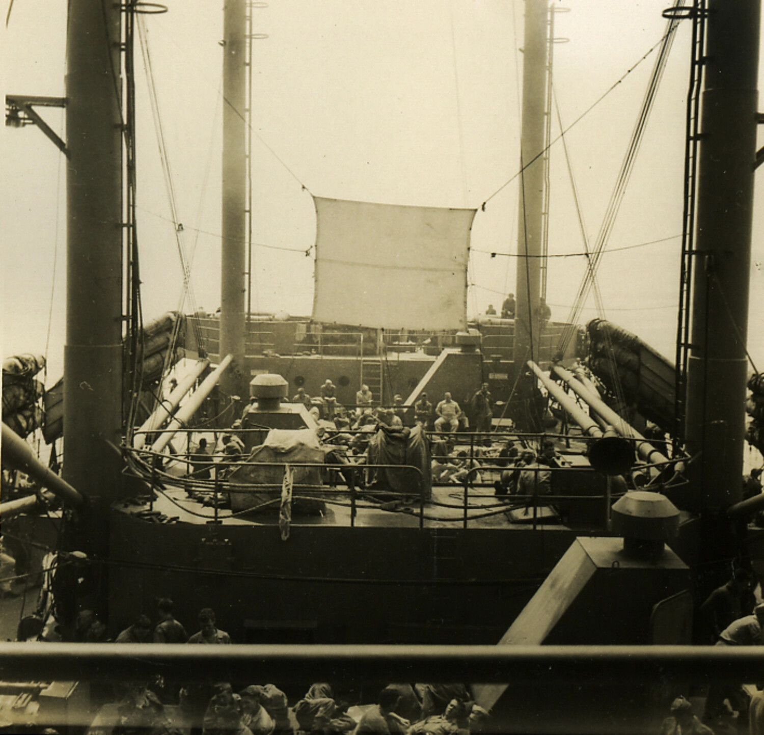 Troops and Crew Gathered on the Well Deck of a Transport Vessel, Pacific Crossing, Late 1940s–1950s