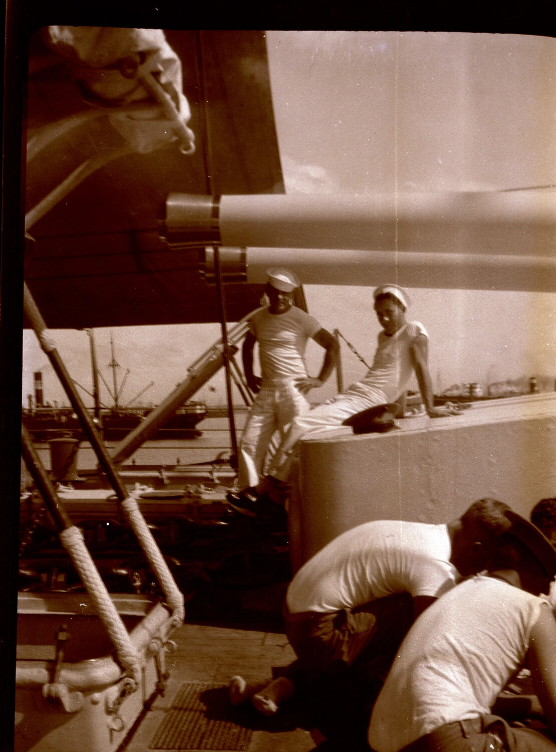 Sailors Atop Twin Deck Gun Mount in Harbor, US Navy Asiatic Fleet, 1930s