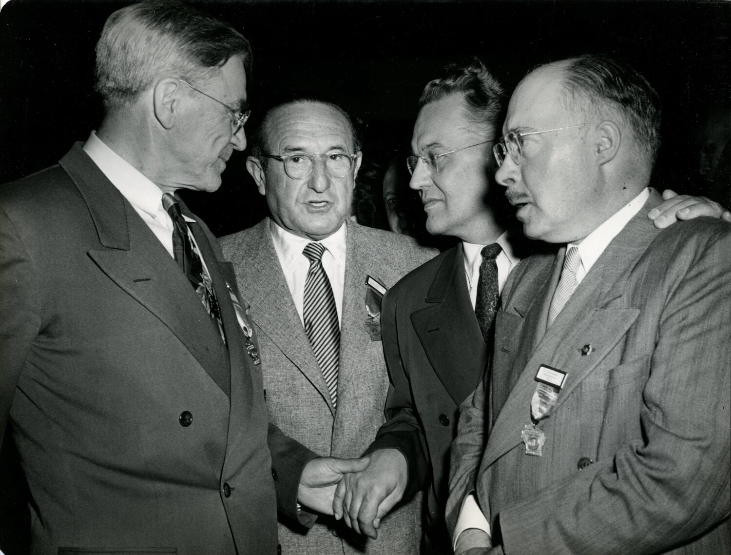 General Officer and Fellow Veterans in Conversation at Reunion Event, Late 1940s