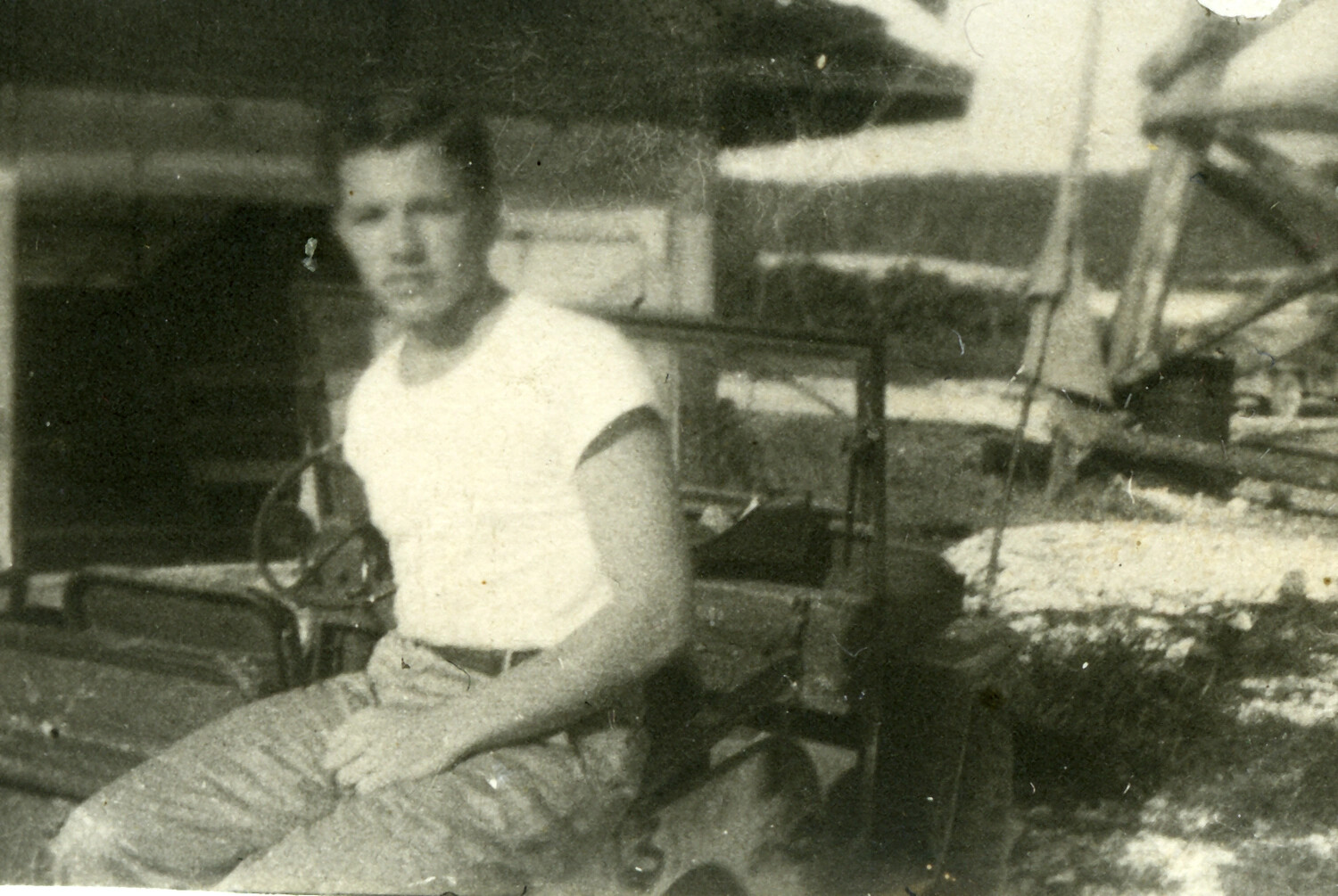 Serviceman Seated on Jeep, Pacific Theater, World War II