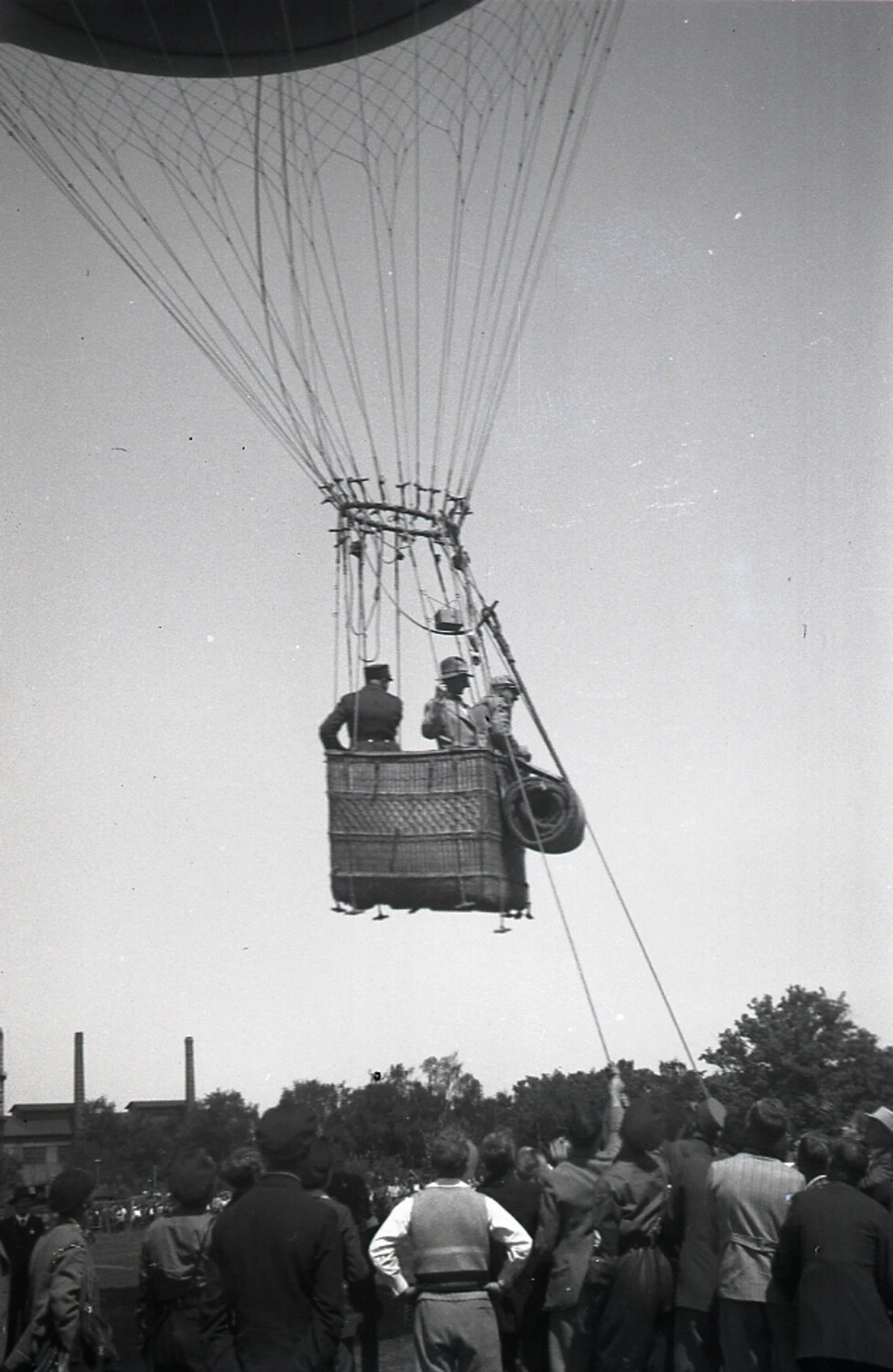 Tethered Gas Balloon Ascending with Passengers in Basket, Likely Early 20th Century