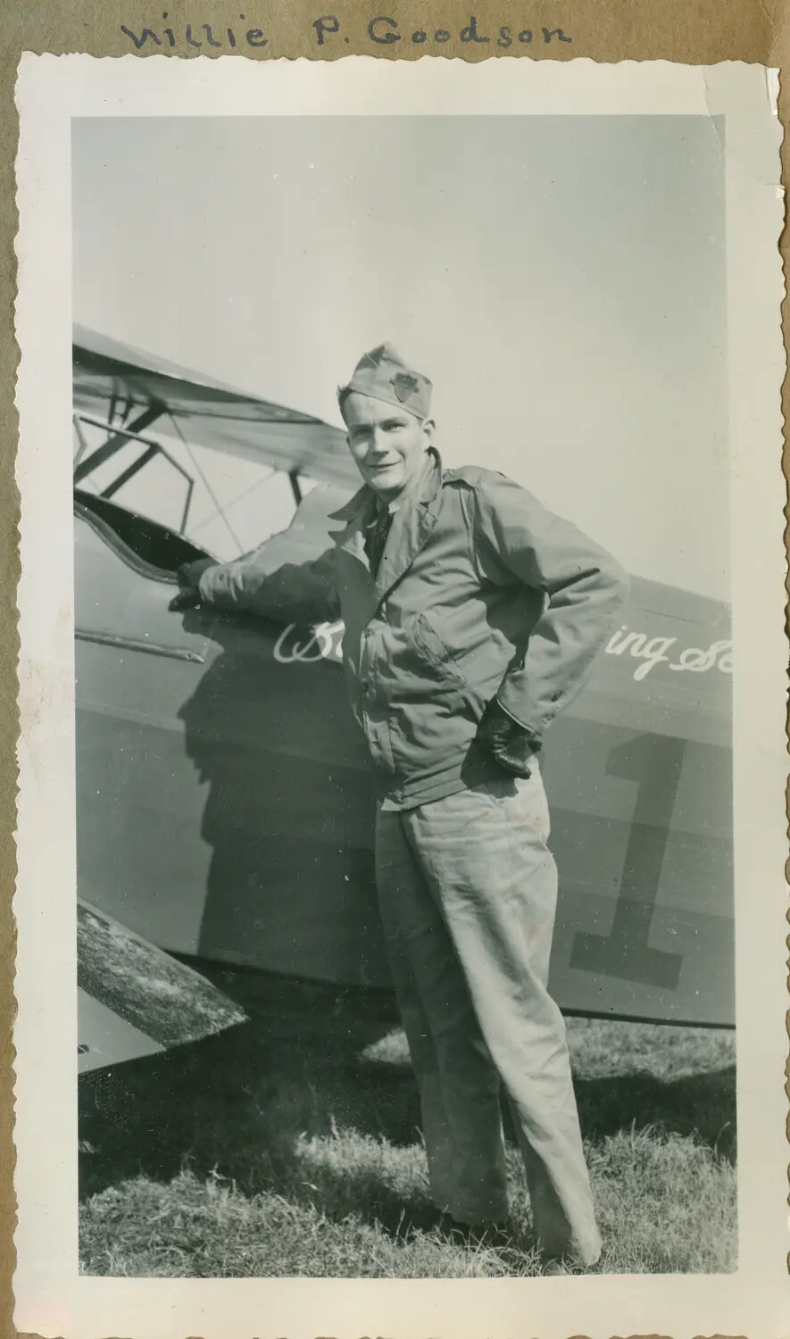 Naval Aviation Cadet Willie P. Goodson Beside Biplane Trainer – Navy V-5 Program Photo Album
