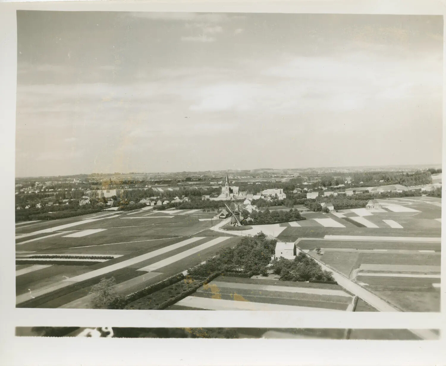 Aerial View of European Town with Church Spire and Windmill, WWII Reconnaissance/Strike Photograph
