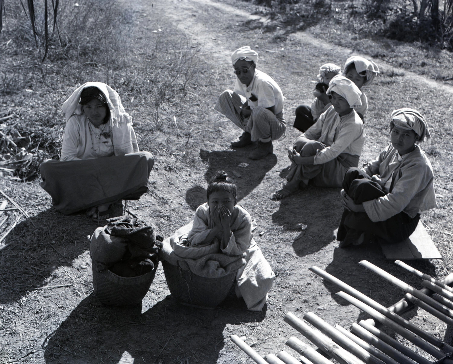 Local Villagers Resting by a Roadside, China-Burma-India Theater, WWII
