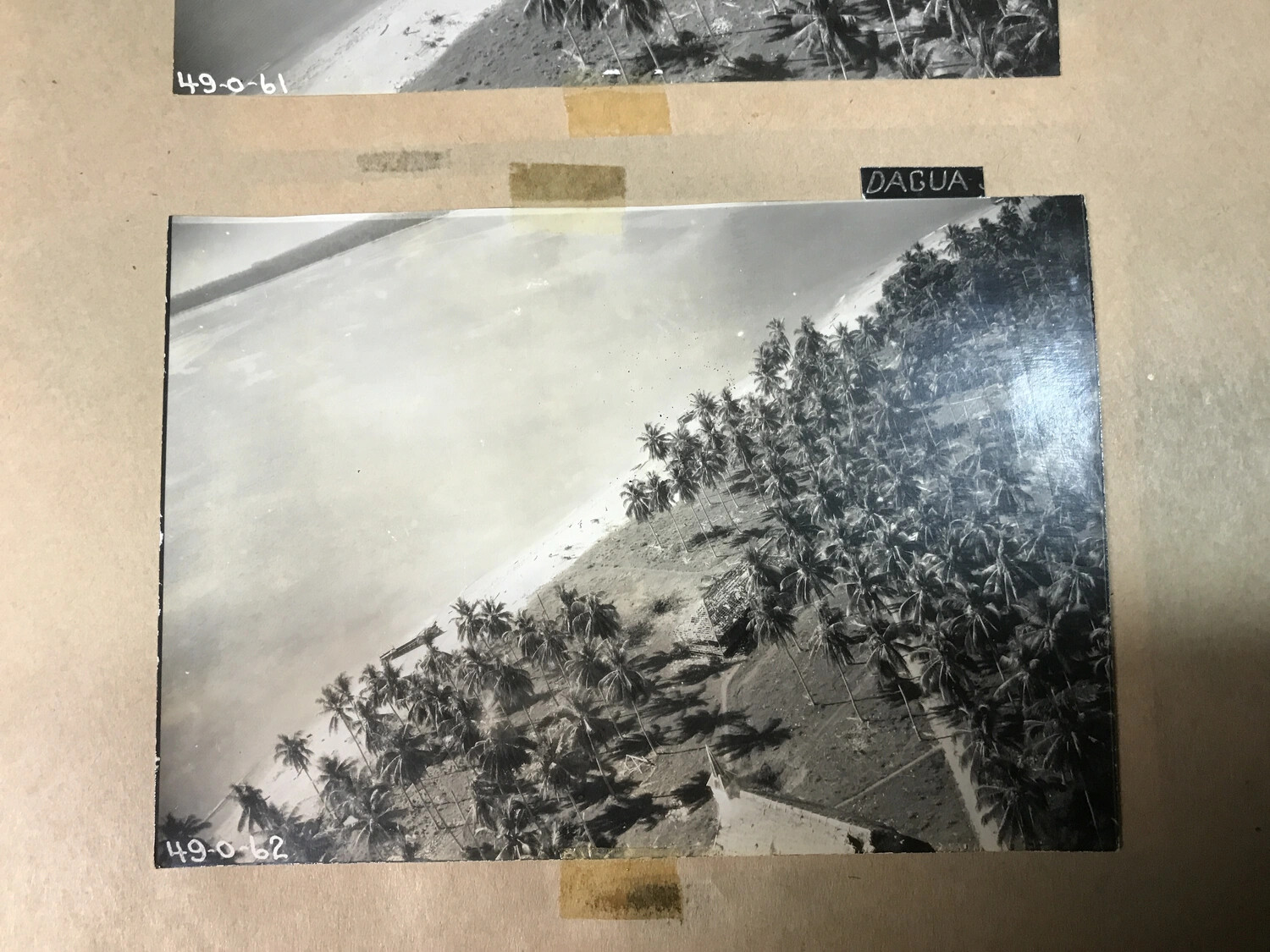 Album Page: Sequential Aerial Photographs of Dagua Coastline, New Guinea