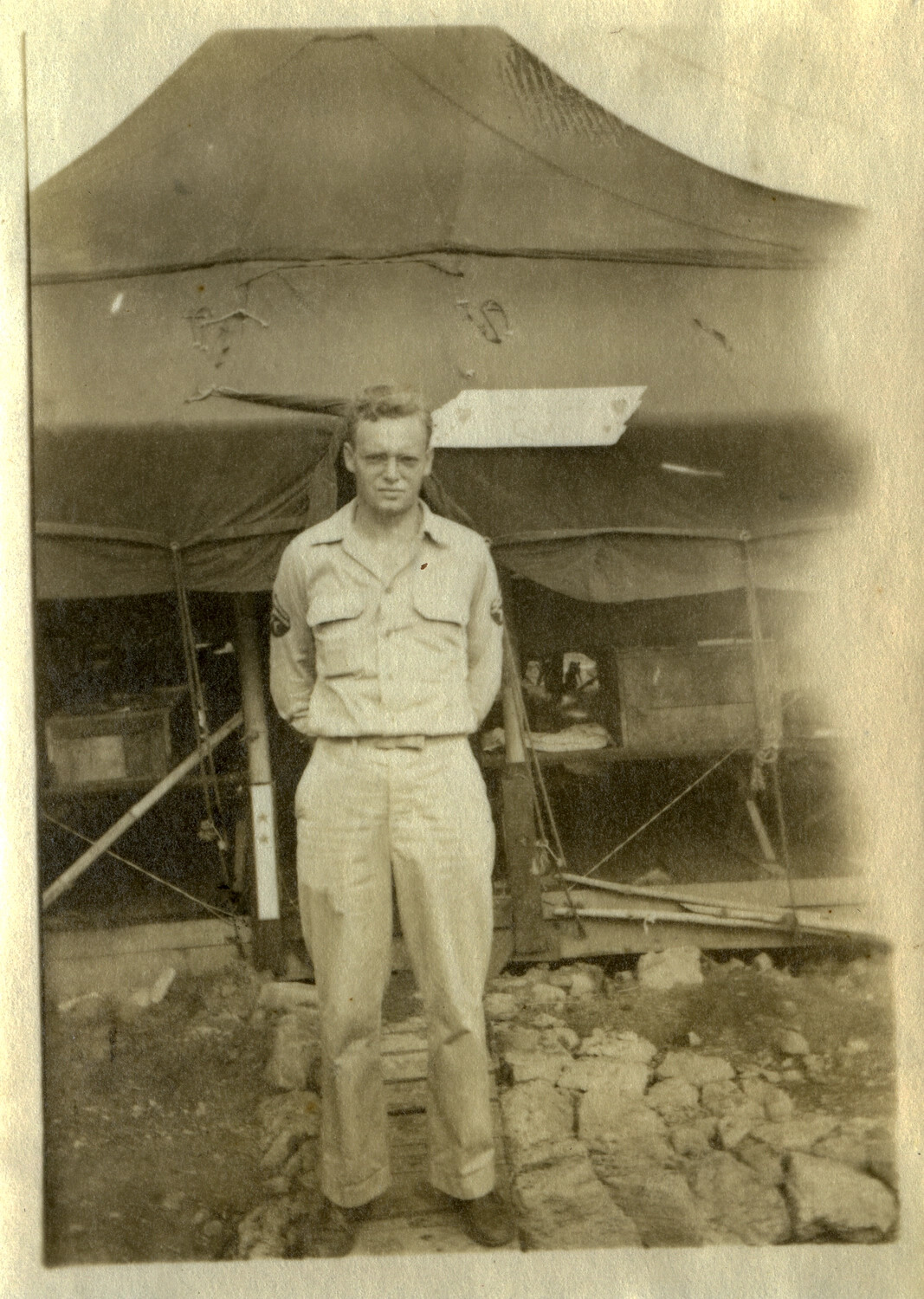 American Serviceman Posed Before Camouflaged Tent, Pacific Theater, World War II