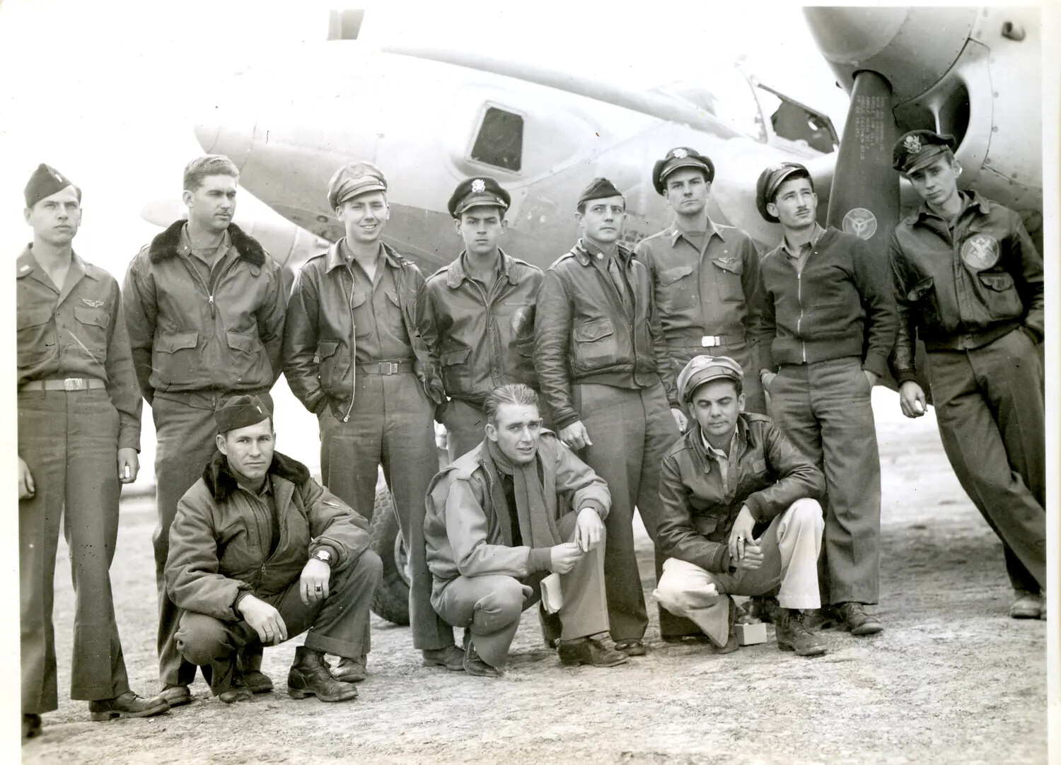 Aircrew Group Portrait in Front of Twin-Engine Transport Aircraft, WWII China-Burma-India Theater
