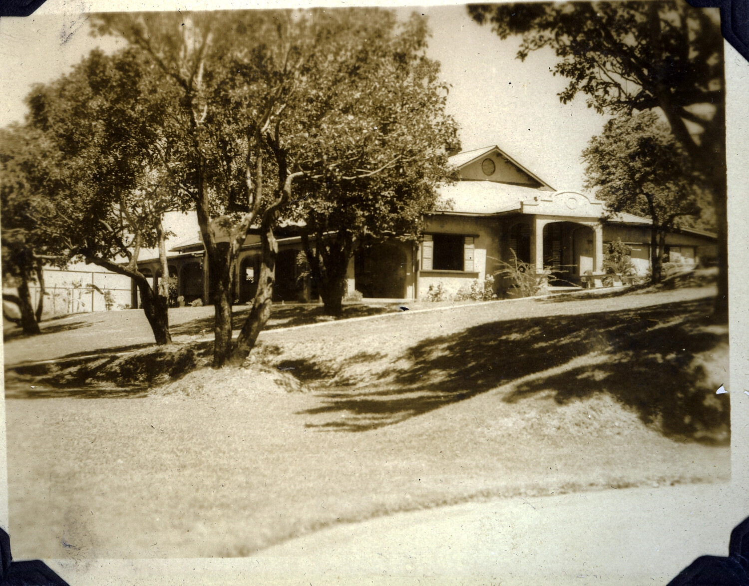 Colonial-Style Bungalow or Officers' Quarters Amid Shade Trees, Manila Area, Philippines