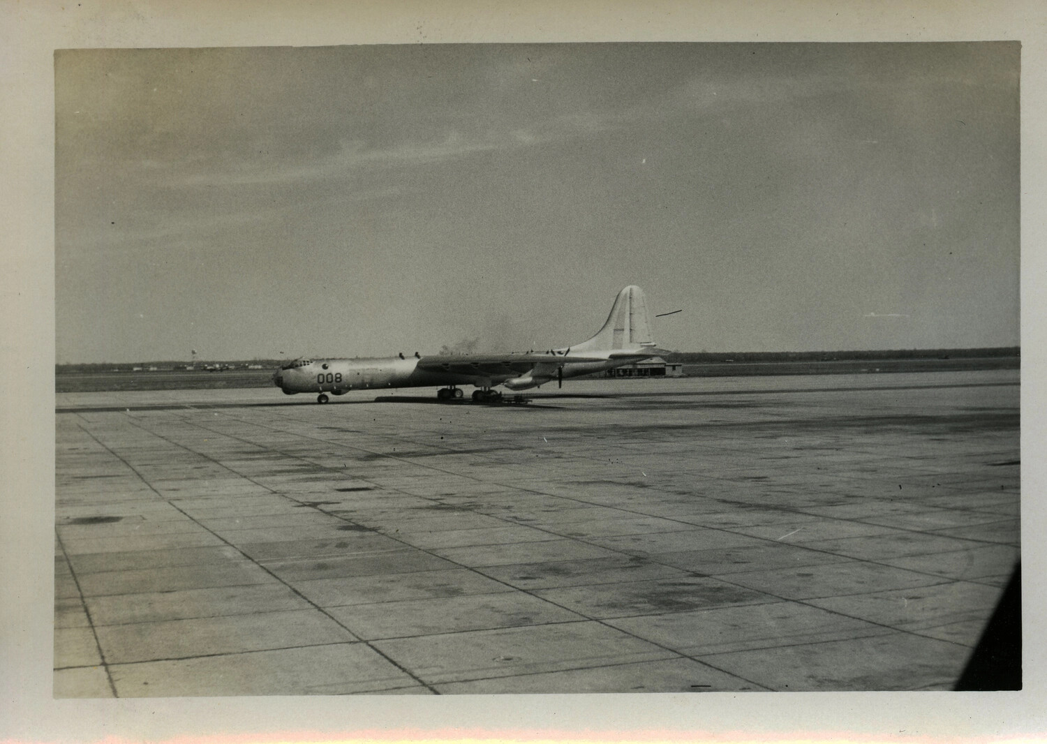 Large Multi-Engine Military Aircraft '008' on Airfield Apron, Postwar/Cold War Era