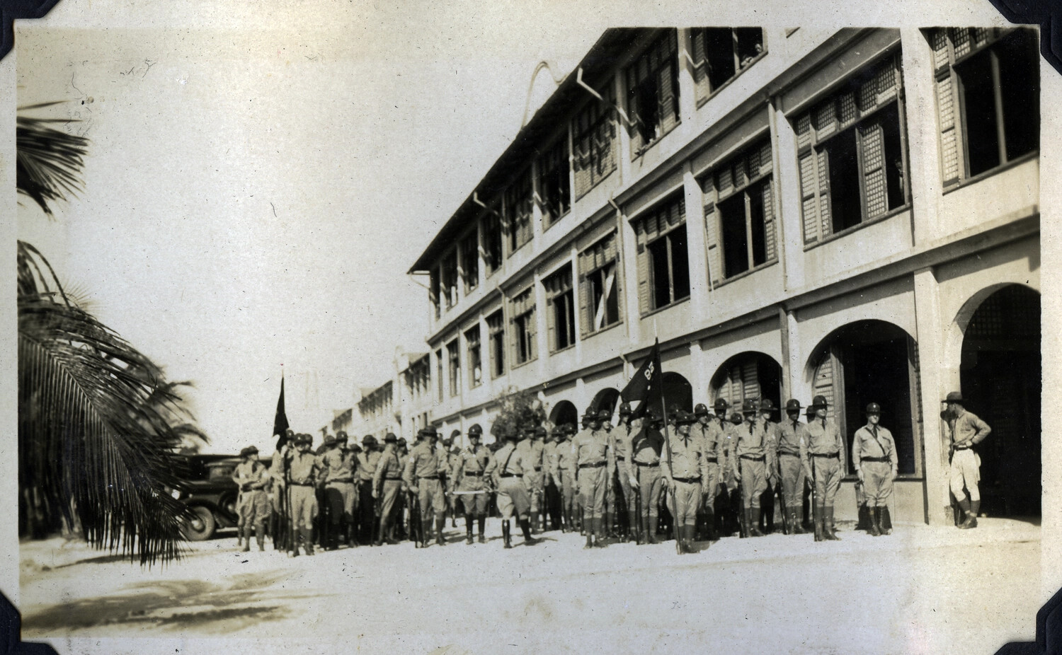 U.S. Army Troop Formation in Front of Colonial-Style Barracks Building, Manila Area, Philippines