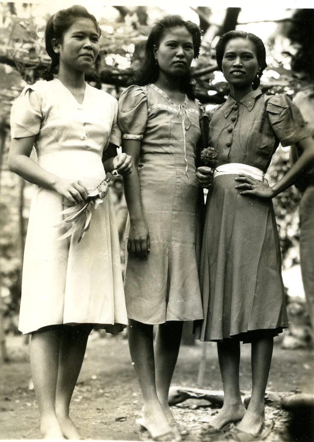 Formal Group Portrait of Three Young Women in Period Dresses, Pacific Theater, WWII Era