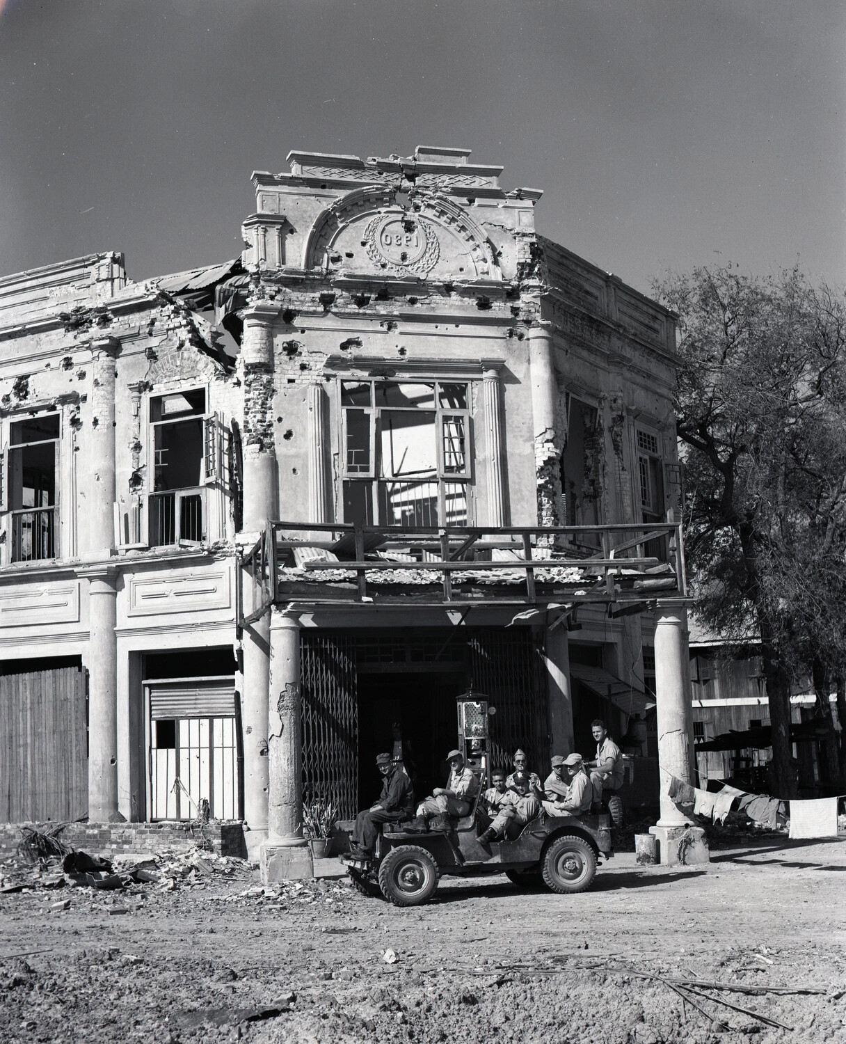 American Servicemen with Jeep Before War-Damaged Building, Burma, World War II
