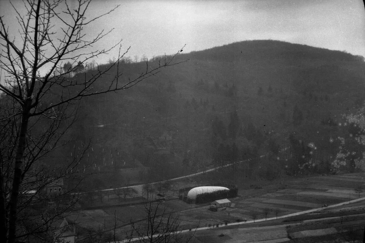 WWI-Era Landscape View with Bessonneau-Type Canvas Aircraft Hangar in French Valley