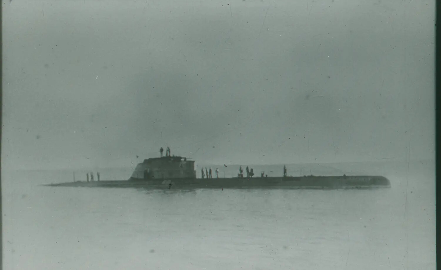 WWII-Era Fleet Submarine Underway on the Surface with Crew Topside