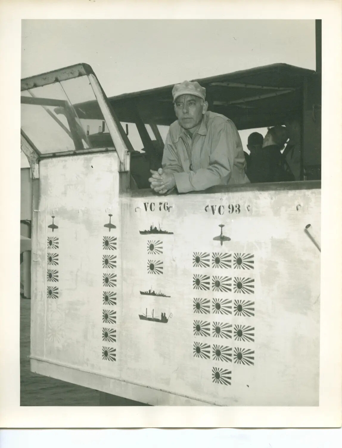 Officer Beside Squadron Victory Scoreboard, USS Petrof Bay (CVE-80), WWII