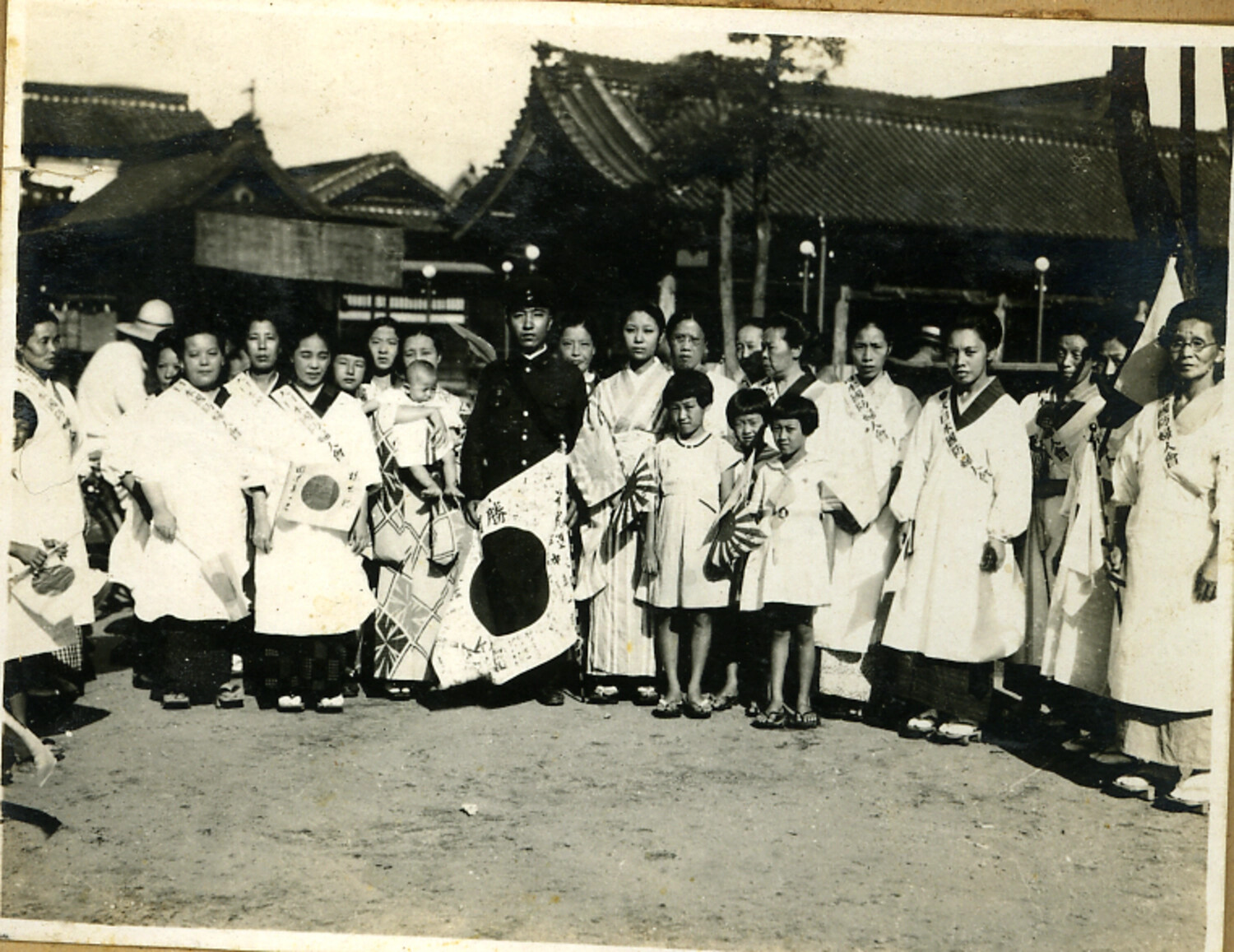 Group Portrait of Japanese National Defense Women's Association Members with Soldier and Children at Shrine Gathering, WWII Era