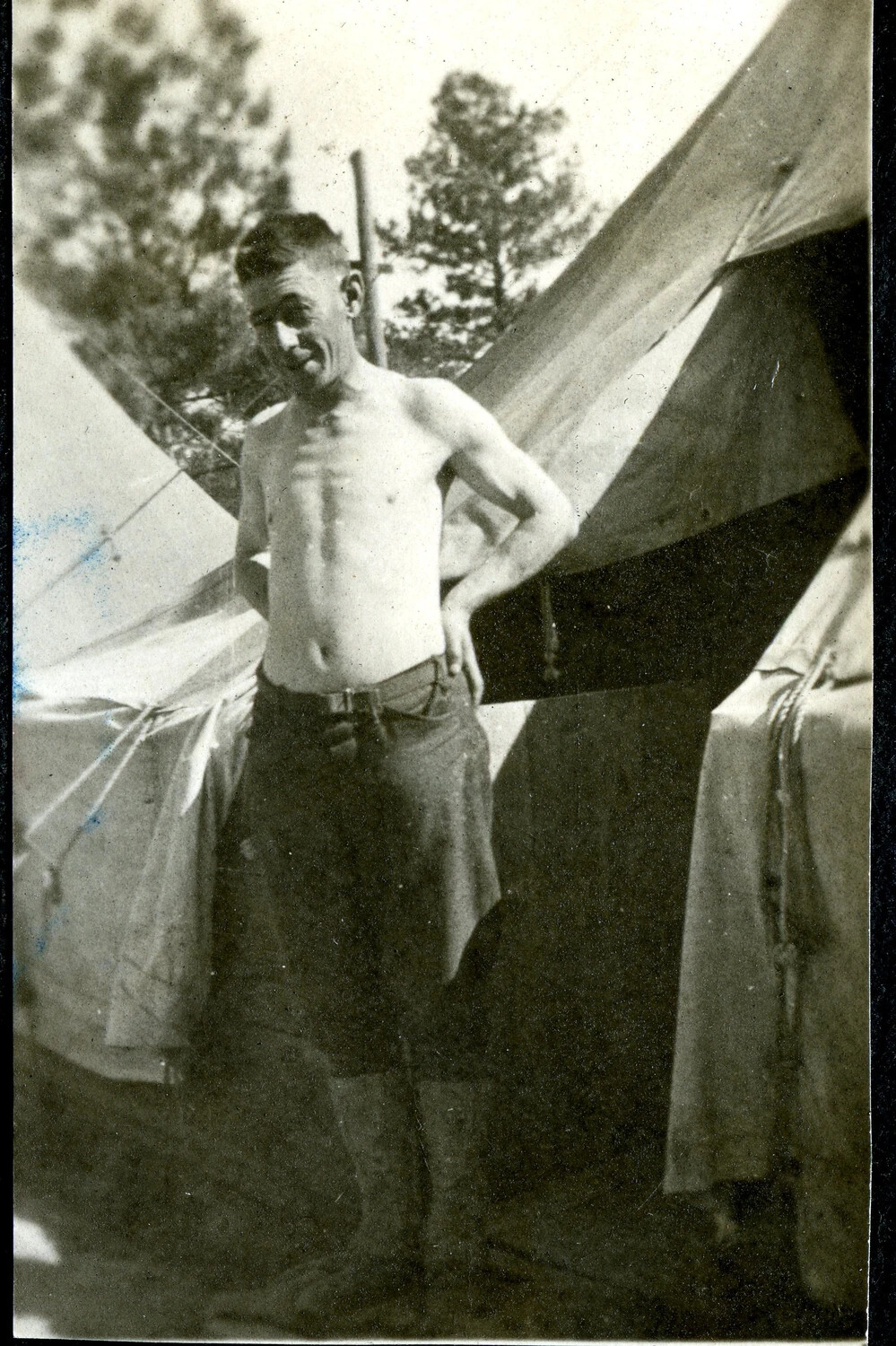 Soldier Posing Between Tents at Training Camp - WWI Photo Album