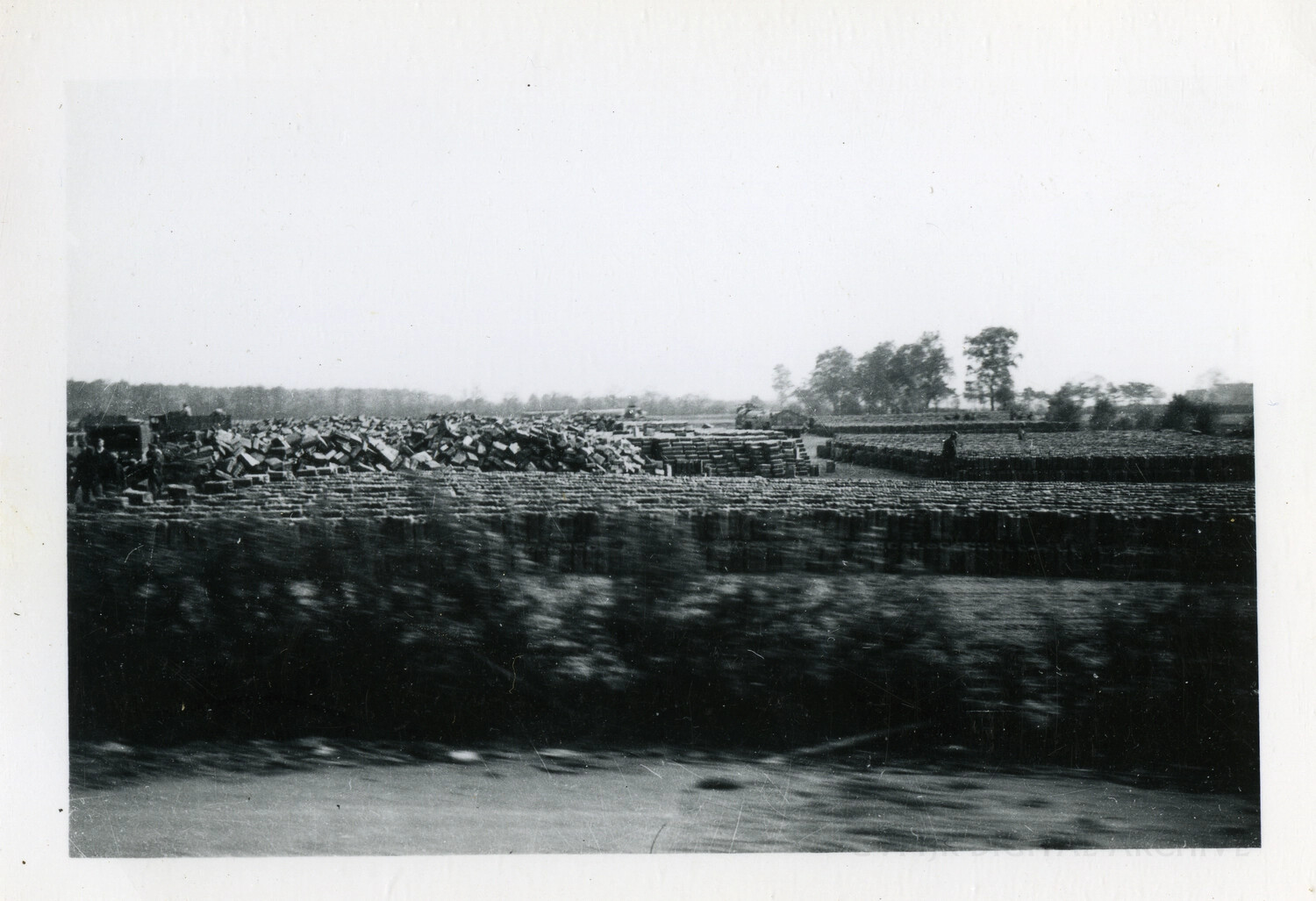 Vast Open-Air Allied Supply Dump, Photographed from a Moving Vehicle, WWII European Theater