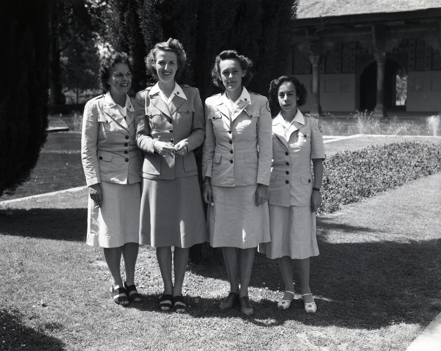 Four Uniformed Women in a Garden, Kashmir (WWII China-Burma-India Theater Collection)