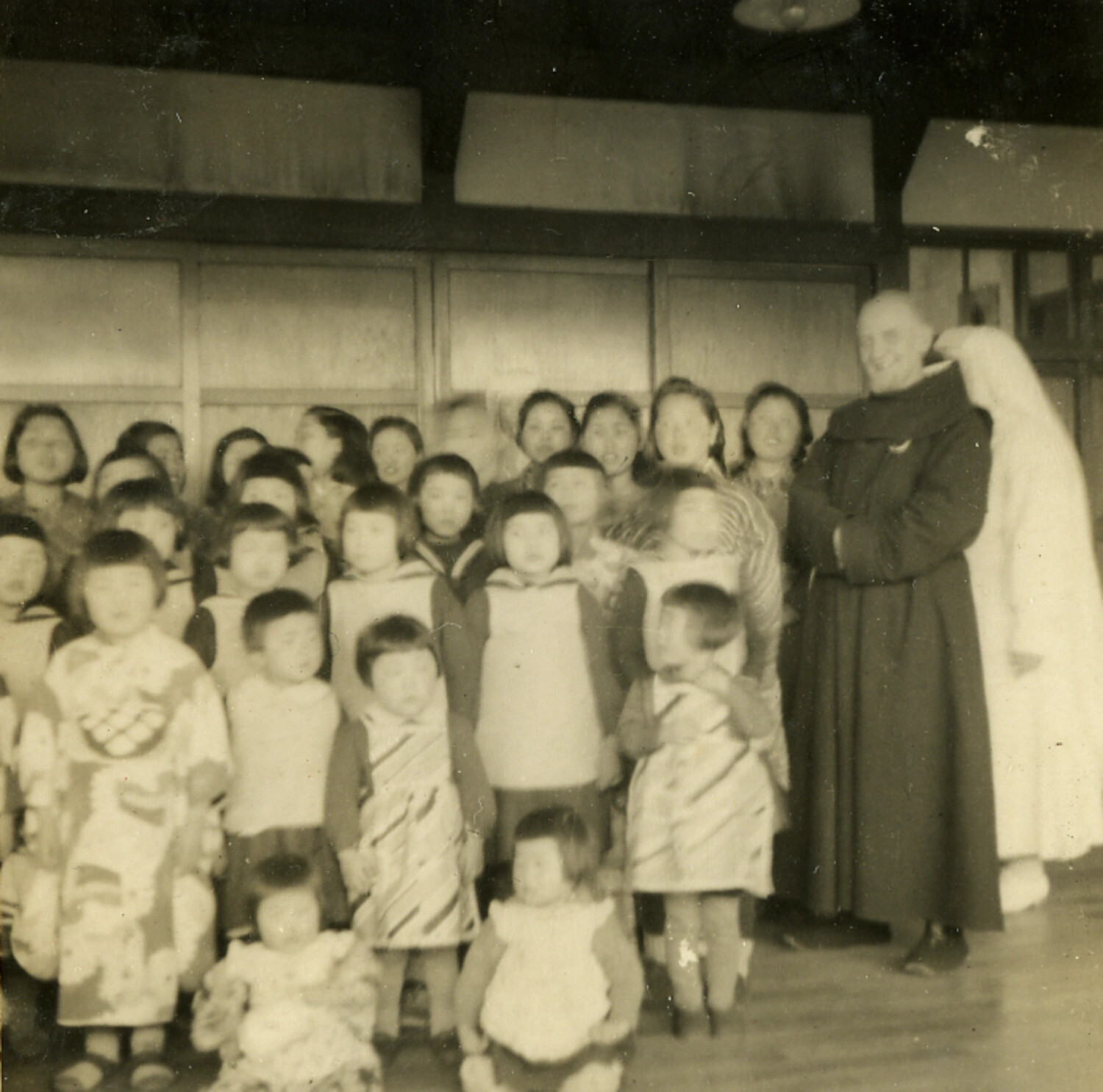 Catholic Missionary with Group of Japanese Children, Postwar Japan, Early 1950s