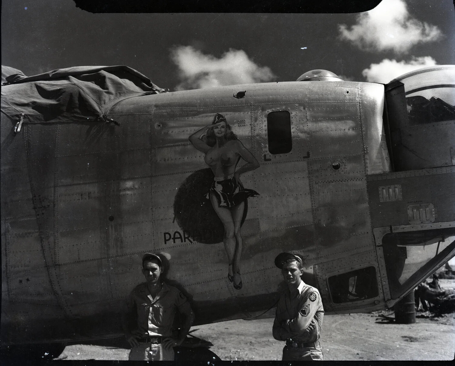 Airmen Beside Bomber Nose Art 'Paradi[se]', 345th Bomb Group, Ie Shima, WWII