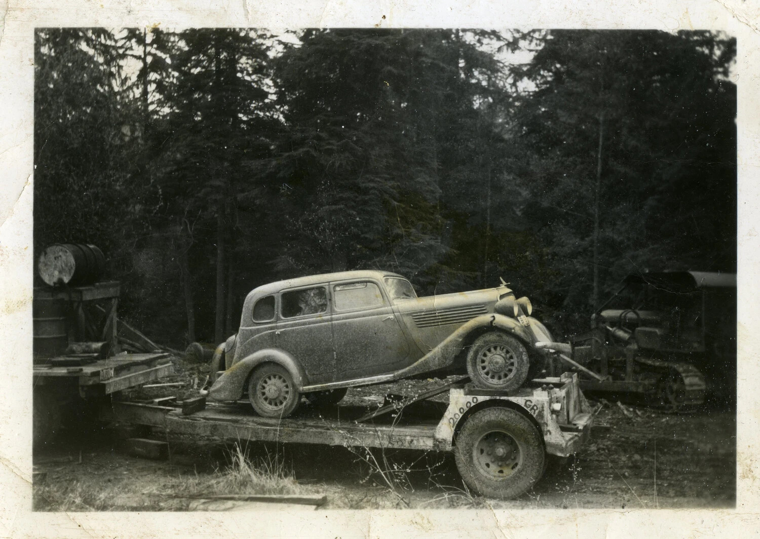 Vintage Sedan on Flatbed Trailer in Wooded Setting, Kwajalein Military Album