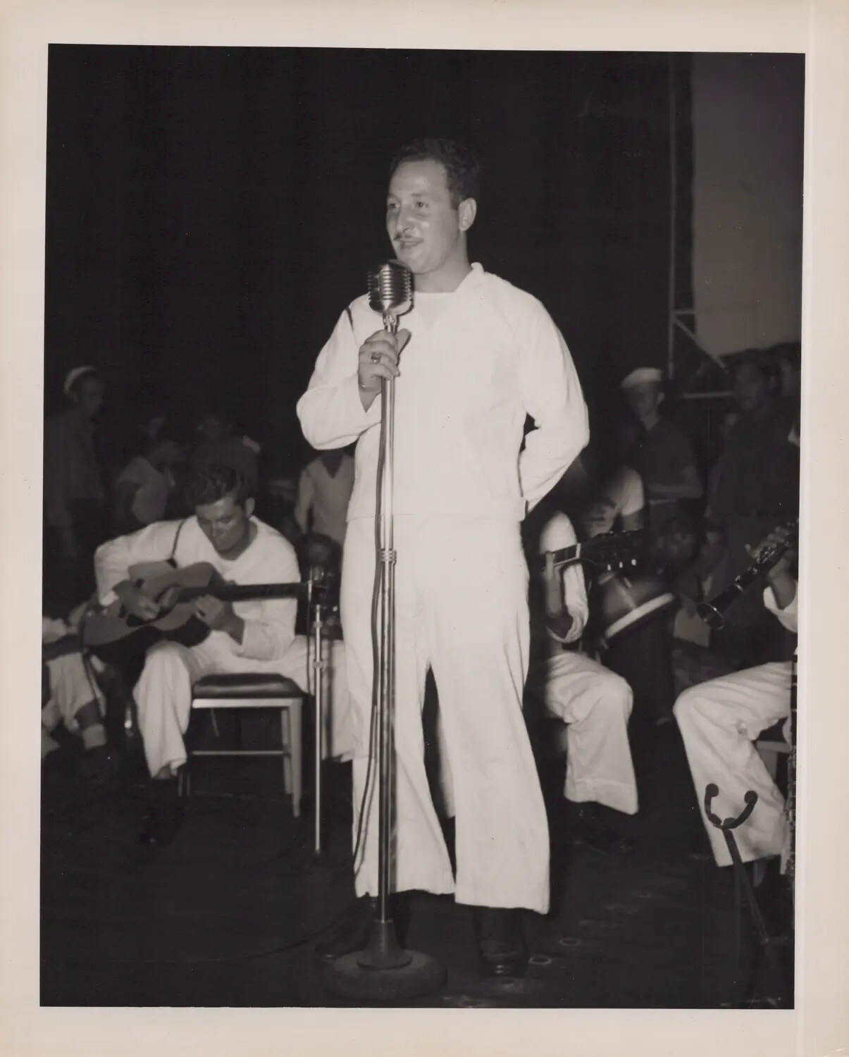 Sailor Vocalist Performing on Stage Aboard Ship, WWII