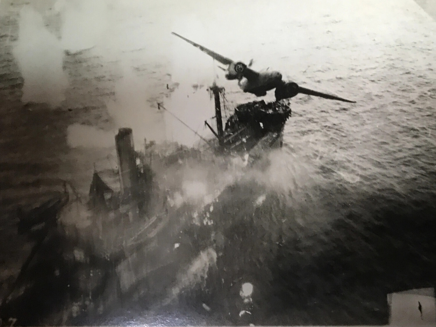 Low-Level Attack Aircraft Strikes Japanese Cargo Vessel, Southwest Pacific