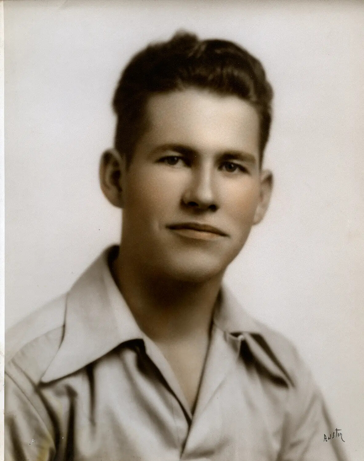 Hand-Tinted Studio Portrait of a Young Serviceman, WWII Era