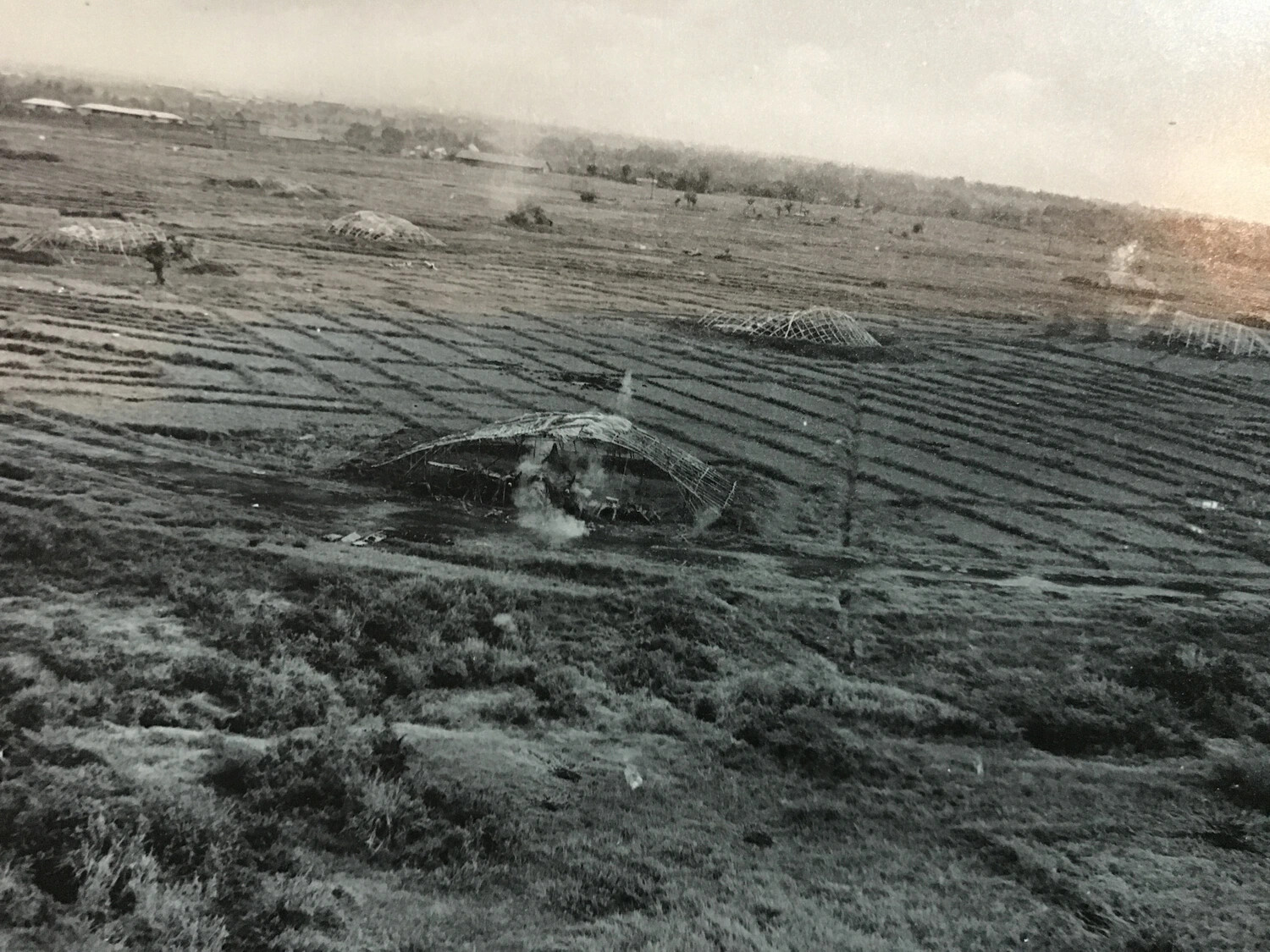 Aerial Strike Photograph of Bombed/Burning Tent Frames in a Field, Pacific Theater (312th Bomb Group, WWII)