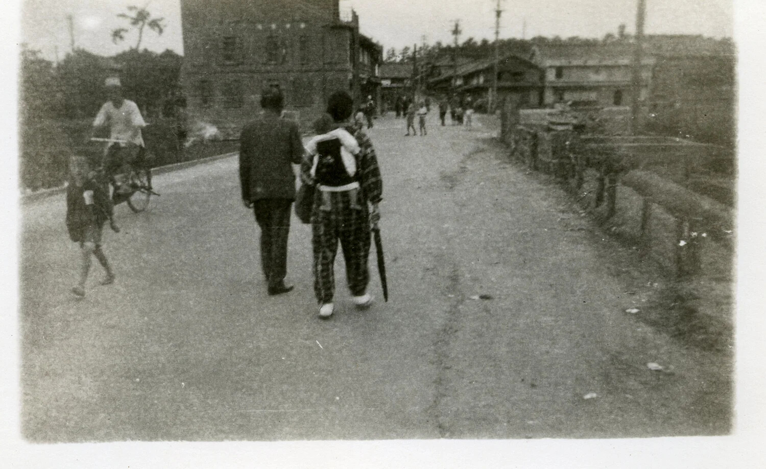 Pedestrians on a Bridge Road, Japanese Town, Occupation Era