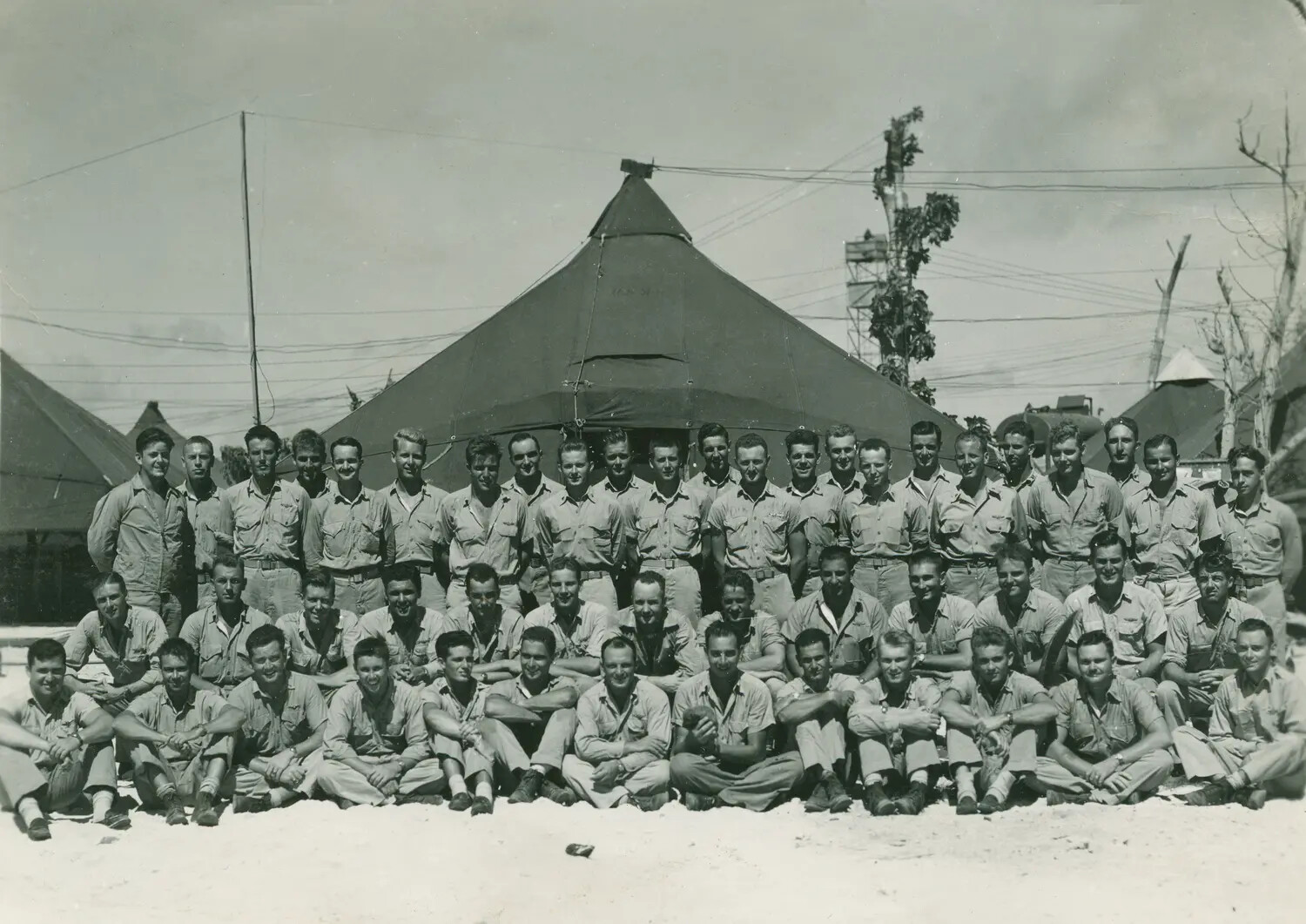 U.S. Servicemen Group Portrait in Front of Squad Tent, Pacific Theater, WWII