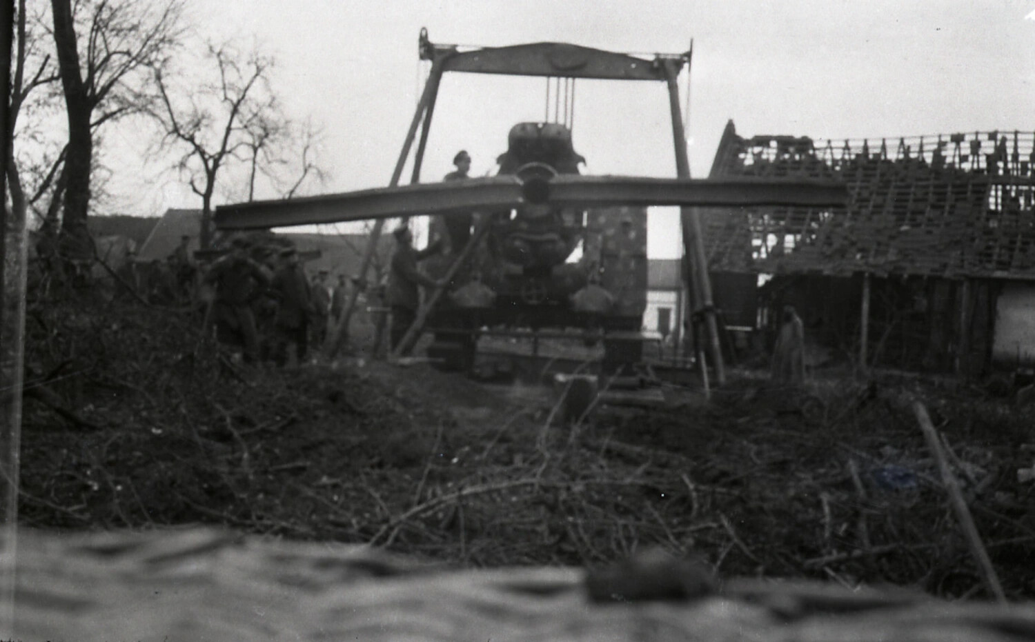 German Soldiers Salvaging/Dismantling a Downed Aircraft with Improvised Wooden Gantry Crane, WWI