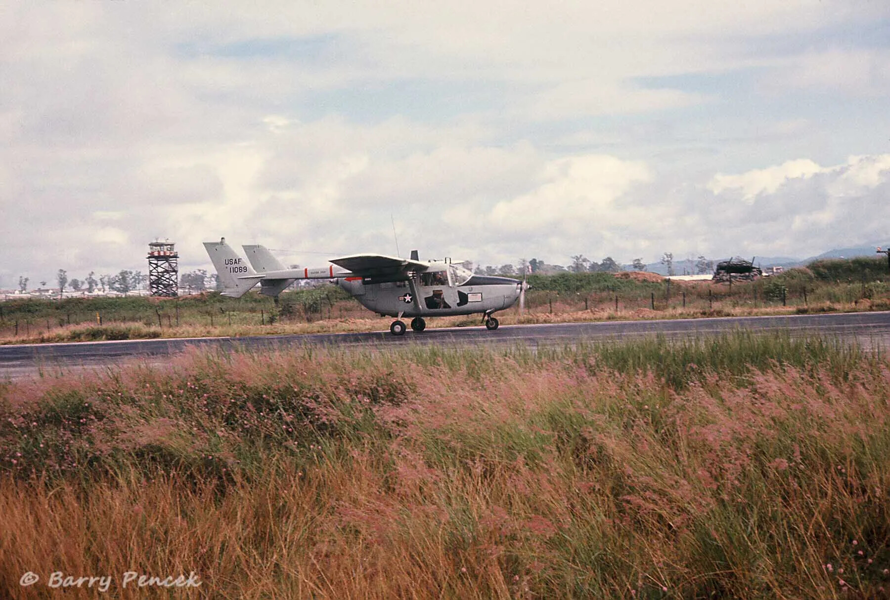 USAF O-2 Skymaster Forward Air Control Aircraft on Airfield Runway