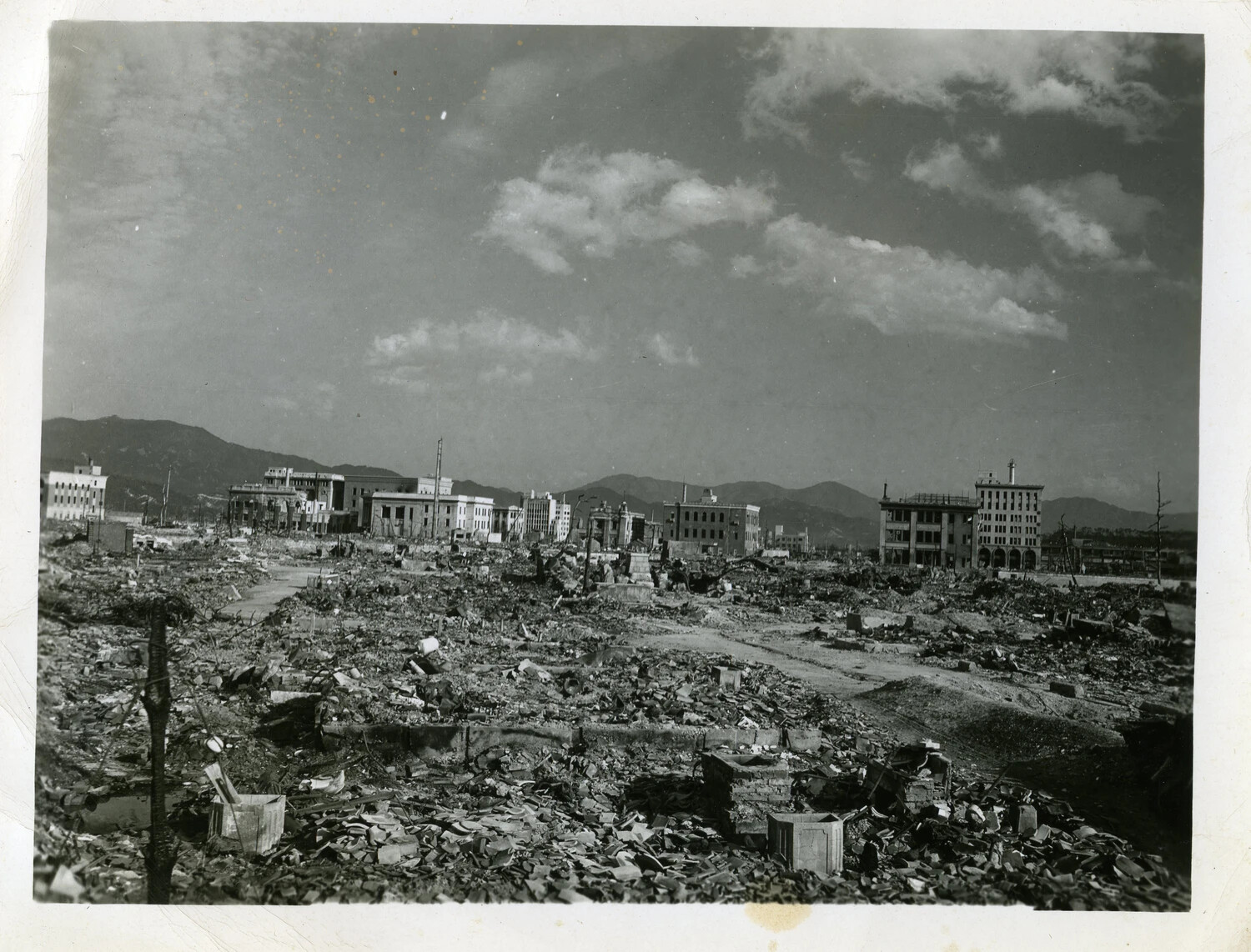 Panoramic View of Hiroshima Ruins with Surviving Buildings and Mountain Backdrop, Japan, Post-Atomic Bombing