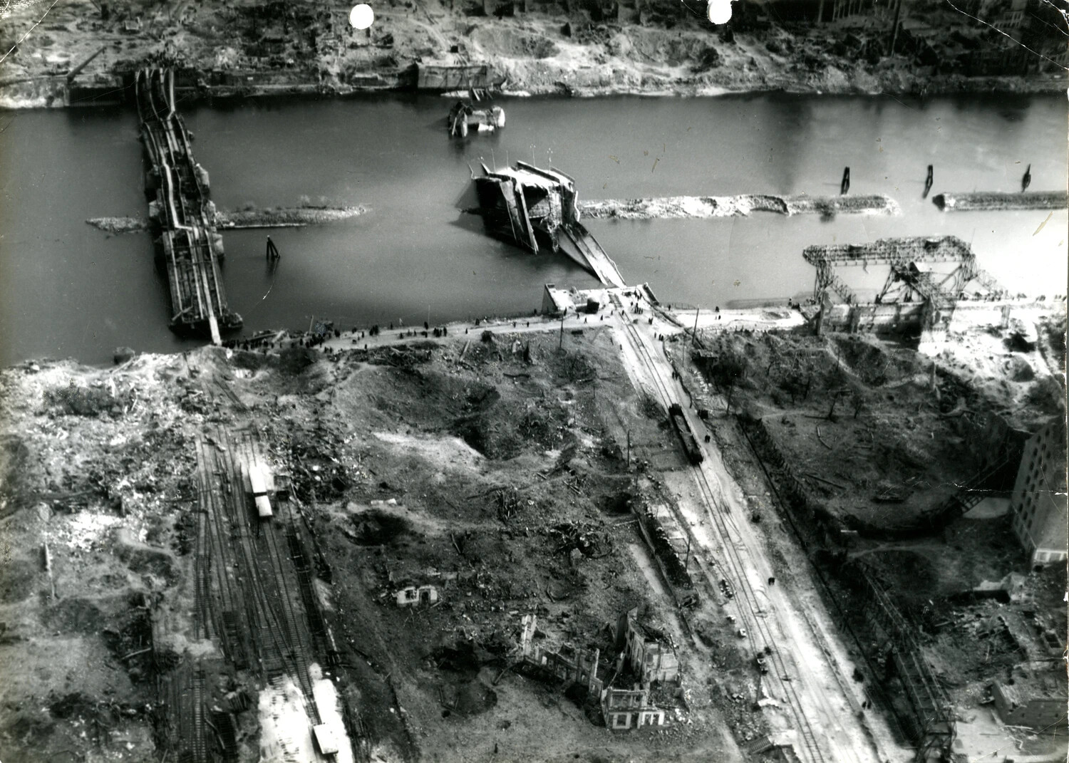 Aerial View of a Destroyed Bridge and Bombed Rail Yard, Germany, WWII (11th Armored Division Collection)