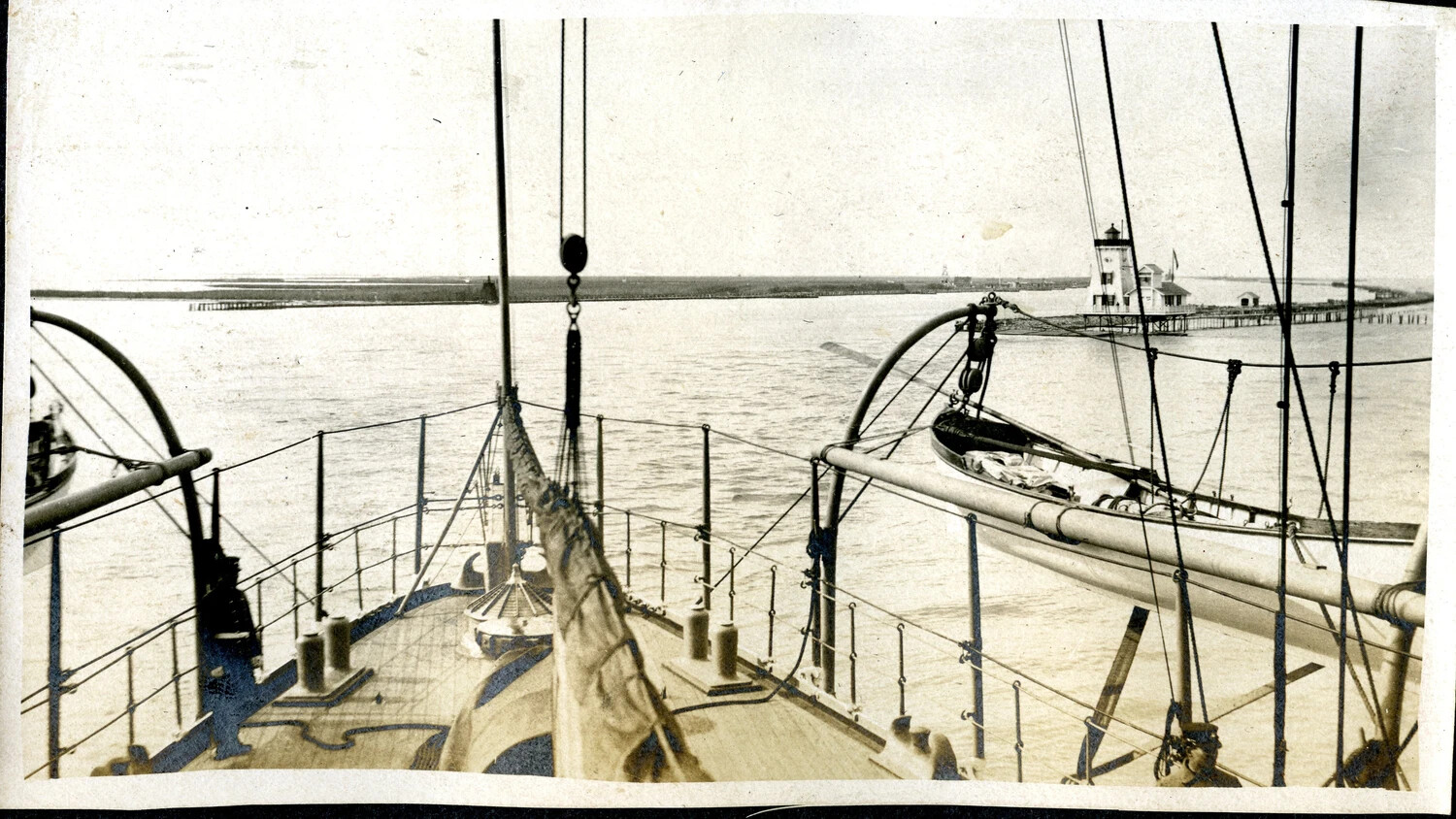 View from Ship's Bow Toward Harbor Entrance Lighthouse, c. 1900s