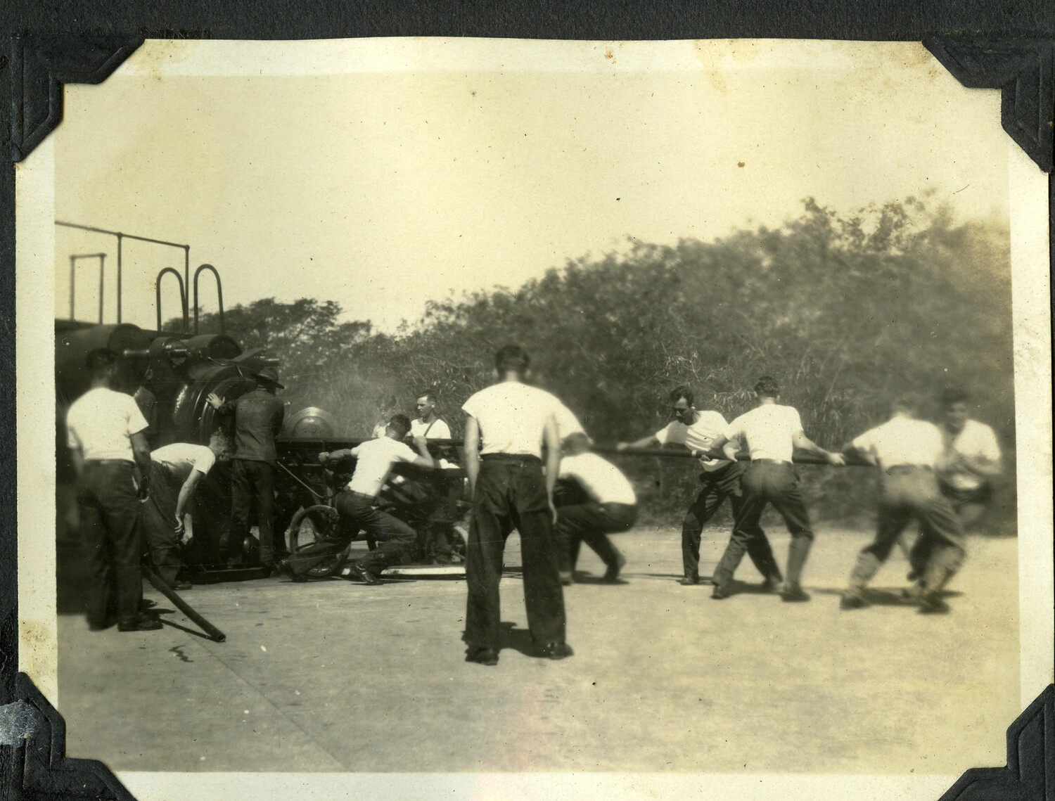 Soldiers Hauling Artillery Piece During Gun Drill, Manila Area, Philippines, c. 1930s–1940s